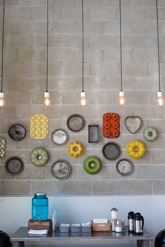 baking molds mounted on a wall
