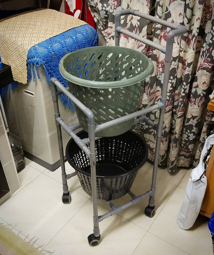 A multi-level PVC frame with wheels and shelves for plastic baskets