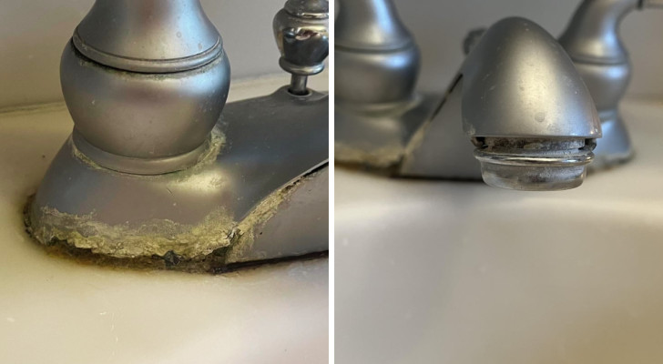 Limescale deposits at the base and on the spout of a metal tap in a kitchen