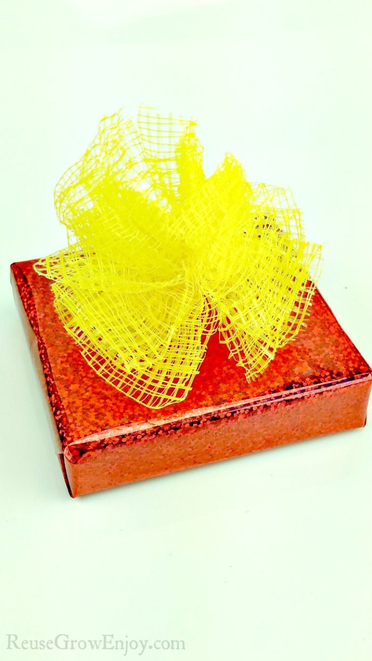 Bow on gift box made with a net bag