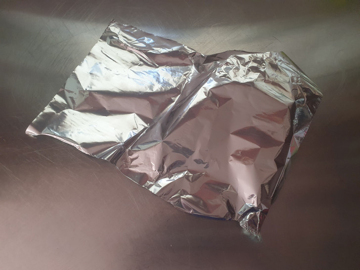 aluminum foil on a kitchen countertop