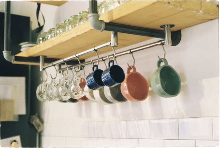 cups, mugs and glasses hanging in up the kitchen