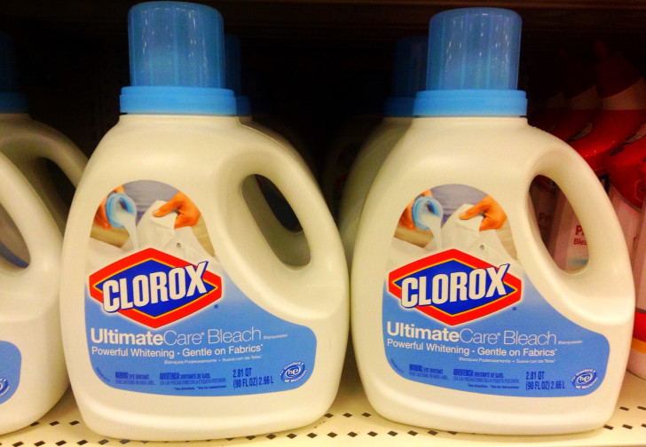 Jugs of bleach on a shelf