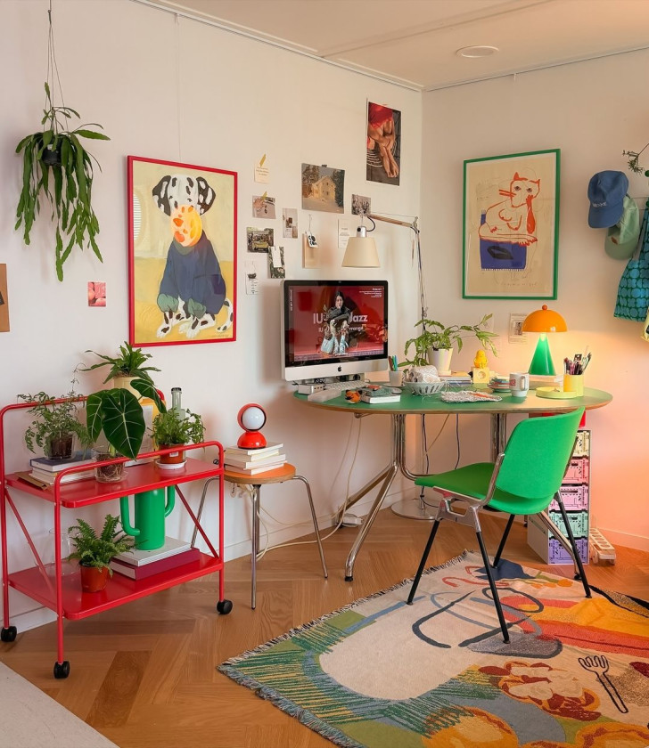 A maximalist workstation with brightly colored furnishings and decorations