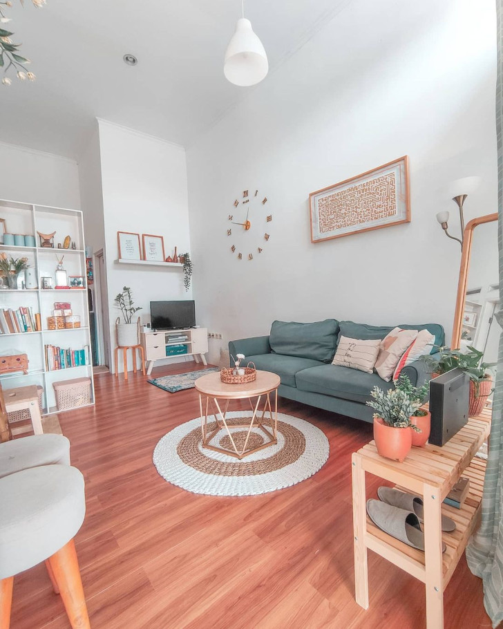 A living room decorated in pastel tones