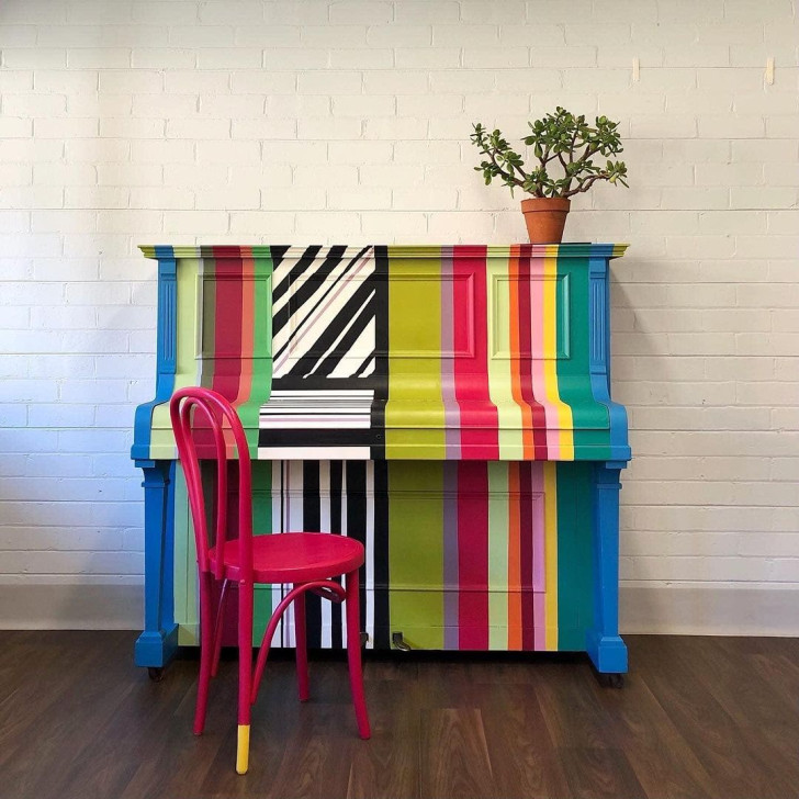 a piano repainted with multi-colored chalk paints