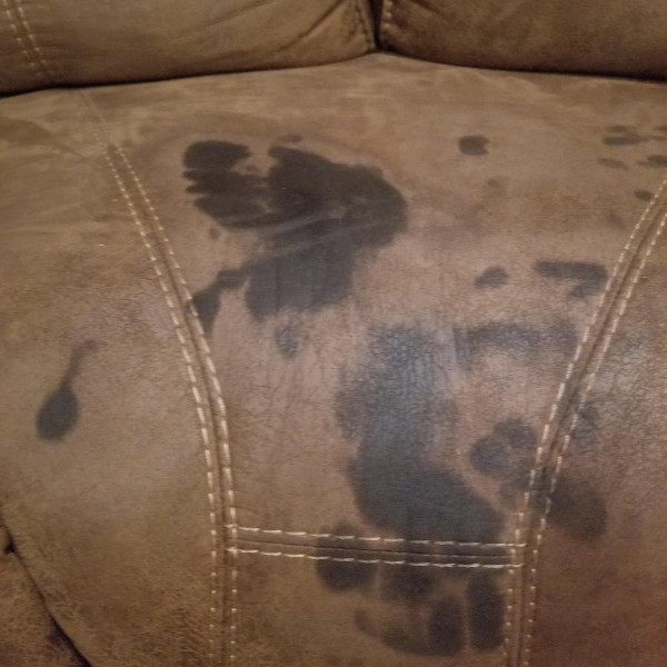 Grease stains on a leather sofa