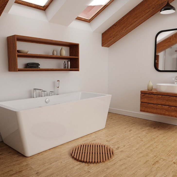 A square tub with simple, clean lines is the focal point in this bathroom