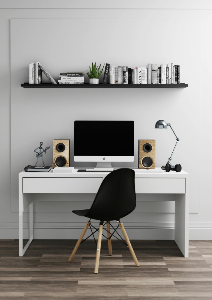 A desk with a shelf mounted at the optimum height above it