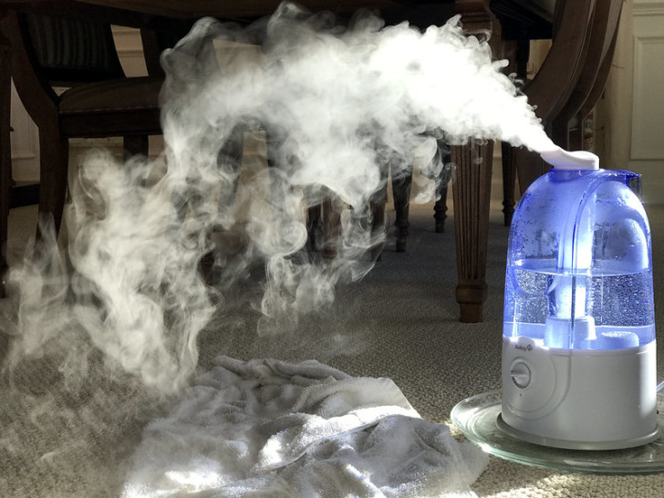 A humidifier operating in a living room