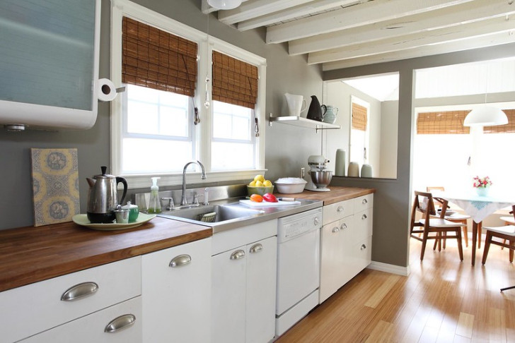 A kitchen with dark bamboo countertop