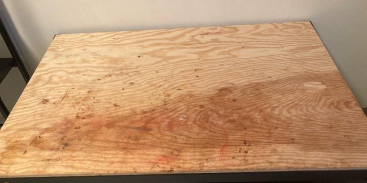 A bamboo countertop damaged by sharp blades