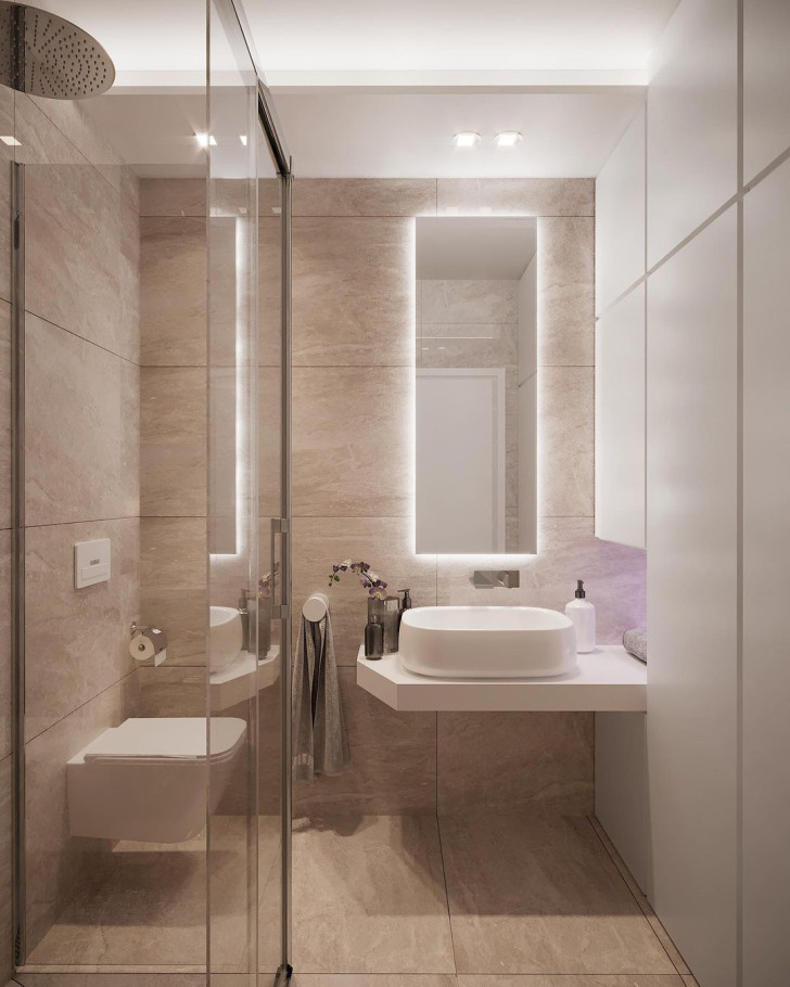 A bathroom with compact, suspended sanitary ware