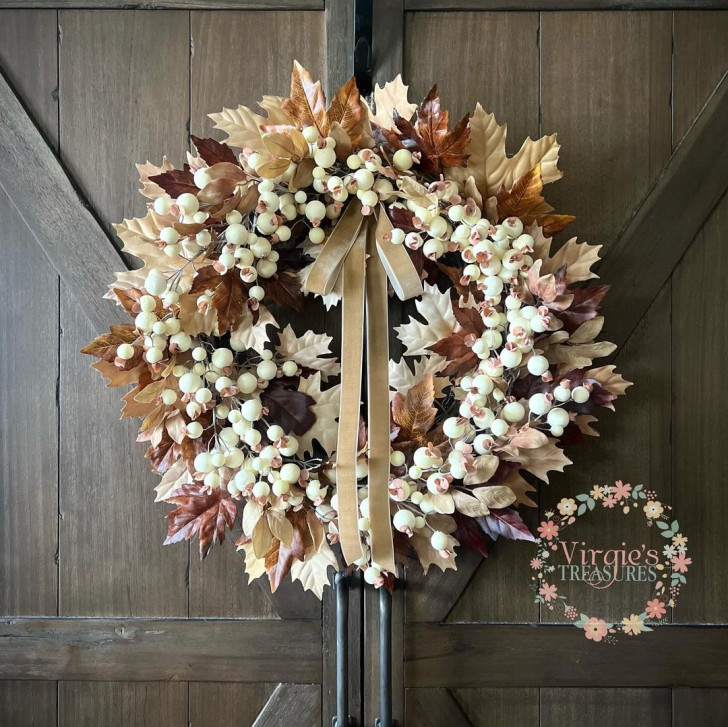 Wreath with brown leaves and white berries