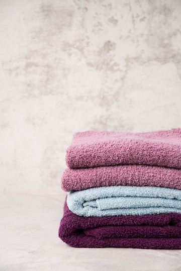 colorful towels neatly folded and stacked