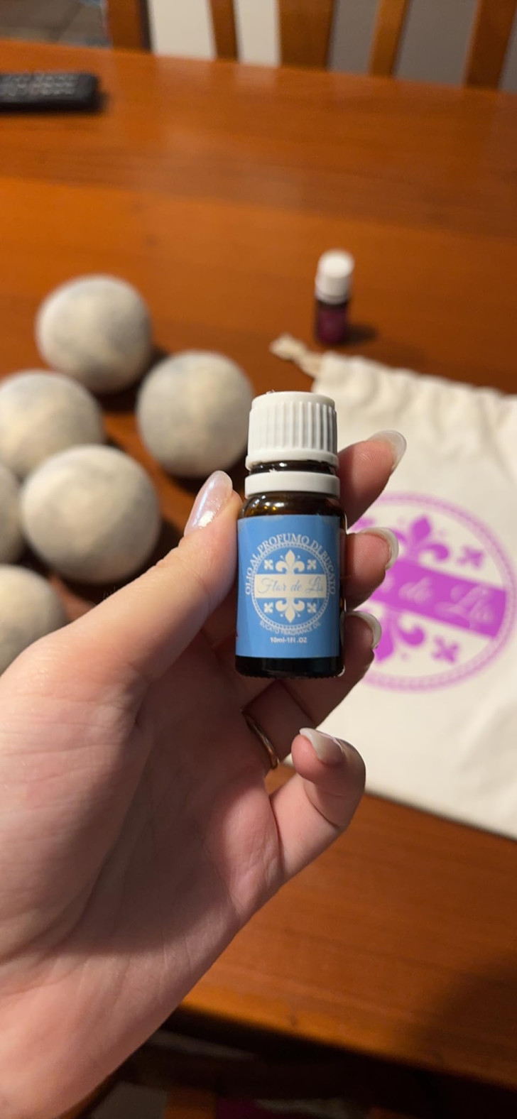 dryer balls and a bottle of essential oil