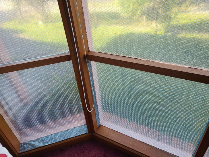 windows with the glass covered in bubble wrap