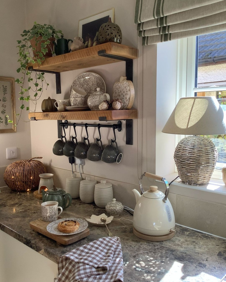 A kitchen equipped with a pumpkin-shaped wicker basket