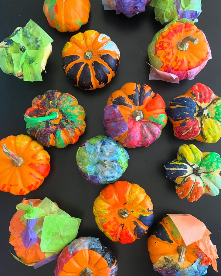 pumpkins painted with colored paints