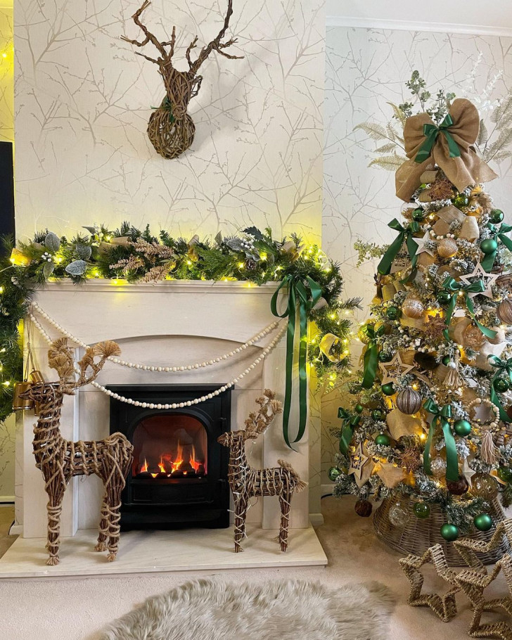 A decorative fireplace arrangement made using natural materials in neutral colors