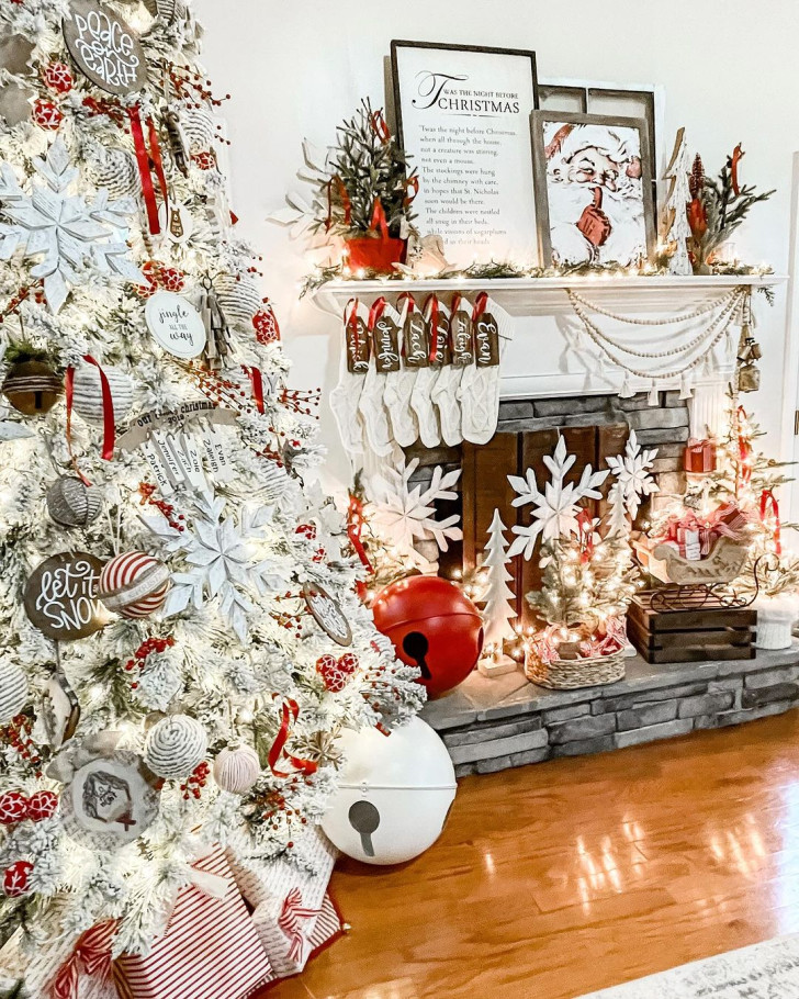 A fireplace decorated in the traditional white and red