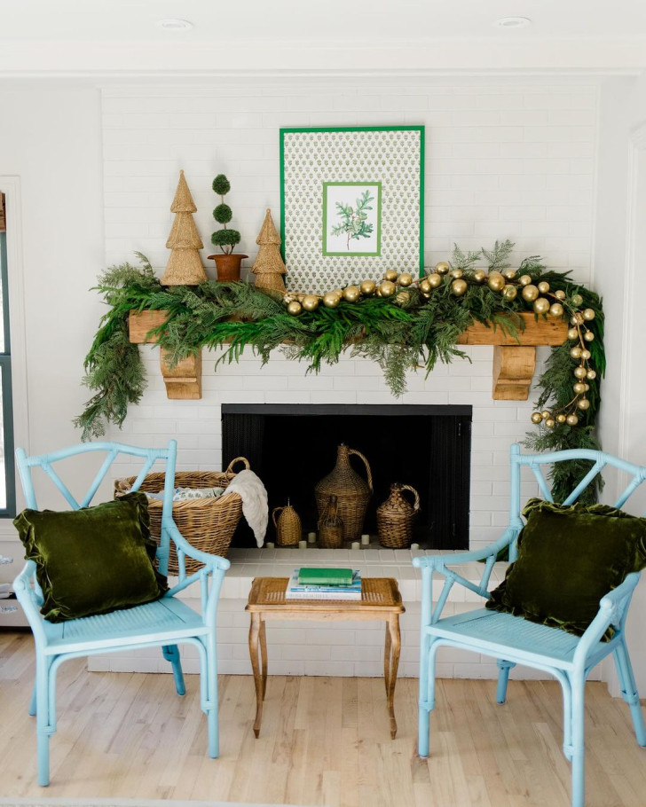 A rustically decorated fireplace in green and gold