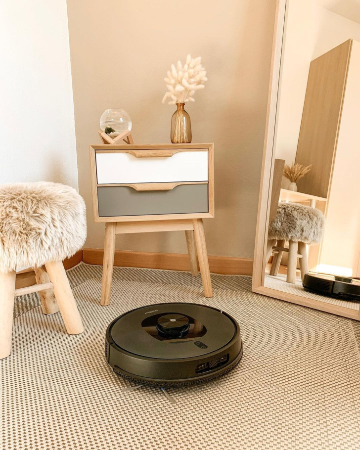 A robot vacuum cleaner operating in a living room