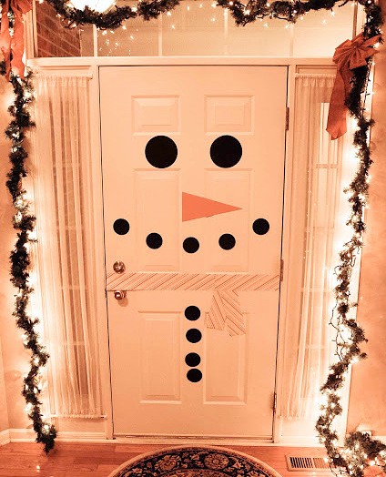 Il pupazzo di neve sulla porta di casa