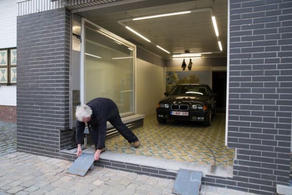 To exit the storefront garage, all you need to do is drive the car down two small strategically placed ramps!