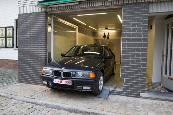 Municipal law prevents him from having a garage door -- but he finds a brilliant solution! - 7