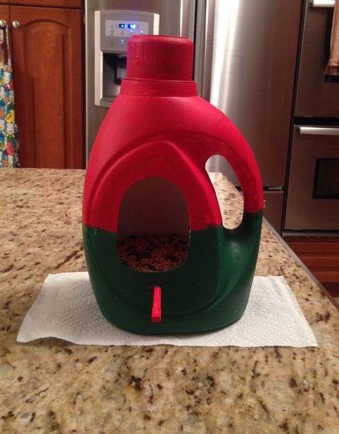 Rinse the inside of a container thoroughly with water, then you can fill it with birdseed and make a bird feeder and shelter for the winter!