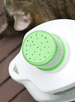 Pierce the bottle cap with several small holes to get a convenient plastic watering can!