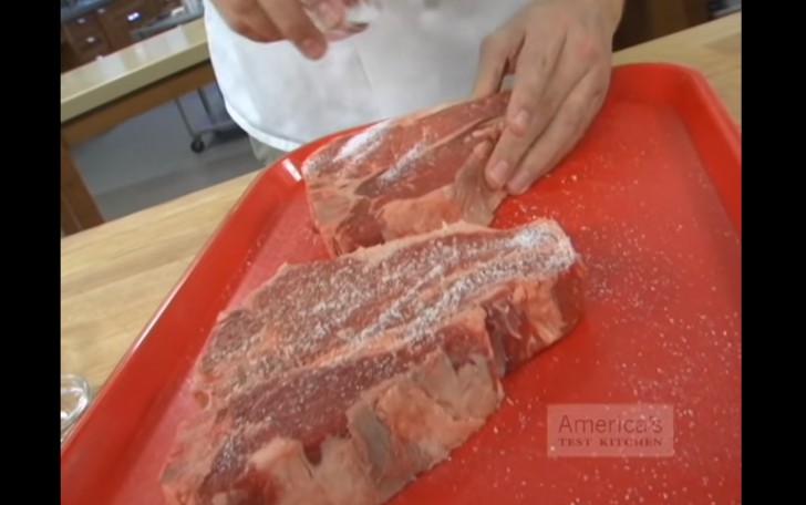 Start by sprinkling salt abundantly on the steaks, and let them sit for an hour.