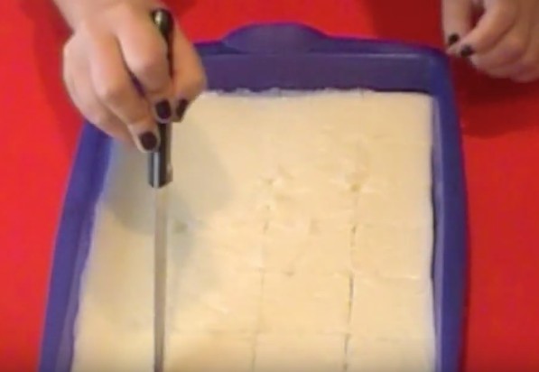 After cooling, cut the solid mixture into squares pieces.