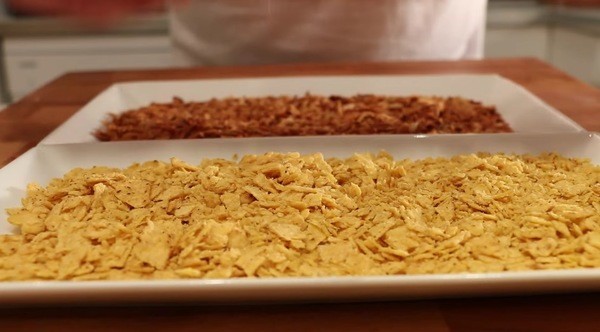 Finely chop some dried onions or crumble some nachos and dip into the mixture until completely coated.