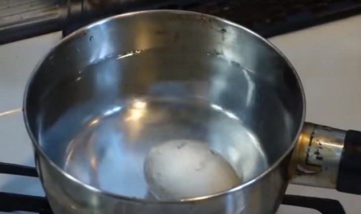 7. Boil it as you would normally to make a hard-boiled egg.