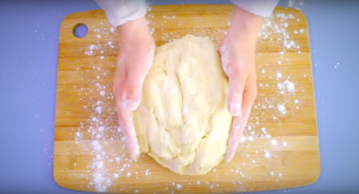 2. Finish by kneading using your hands and laying the dough on a floured surface.