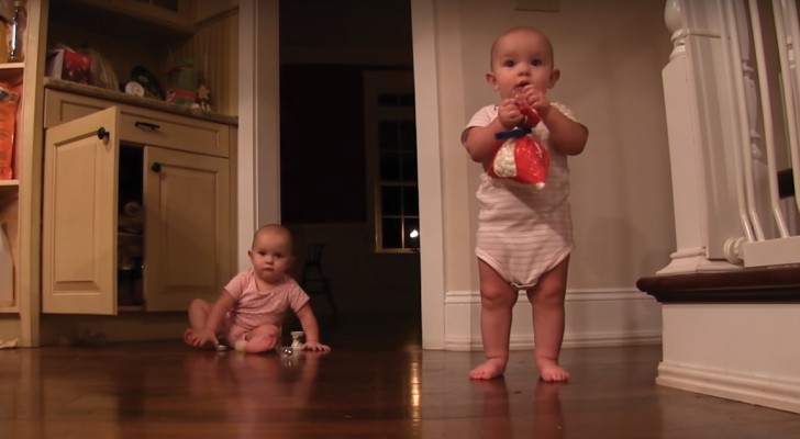 Twin babies share sweets and lots of laughs!