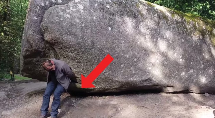 Esta roca pesa 137 toneladas, pero cuando èl prueba a moverla? Wow!!