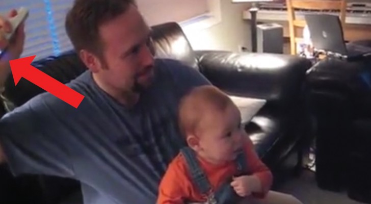 When dad turns on the Wii . . . watch his baby son's reaction!