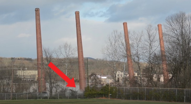 An impressive smokestack demolition!