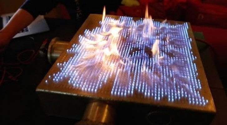 He plays music in a pyro board: the flames effects are awesome ! 
