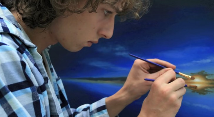 Questo ragazzo ha meravigliato migliaia di persone dipingendo stupendi quadri a due mani