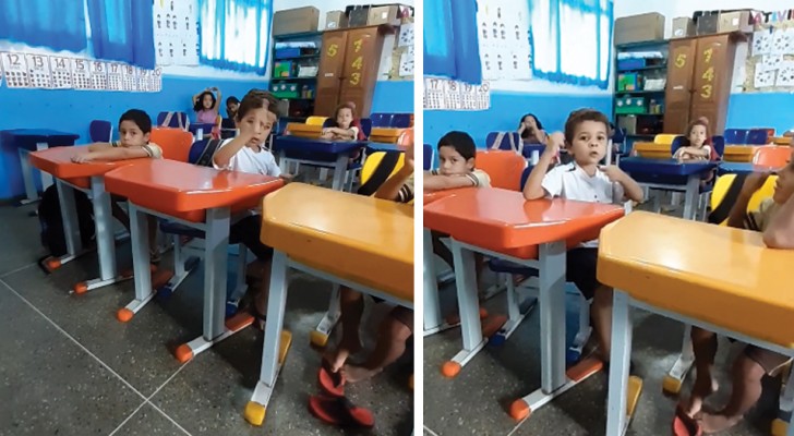 Na sala de aula está um menino surdo: o seu colega traduz "Chapéuzinho Vermelho" para ele na língua dos sinais 