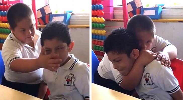 This young boy with Down syndrome embraces and comforts his autistic classmate