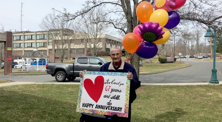 This husband can't see his wife during quarantine, so he celebrates their 67th wedding anniversary from her nursing home's second floor window 