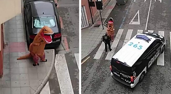 Die spanische Polizei hält einen als T-Rex verkleideten Mann an, der während der Quarantäne die Straße entlang läuft