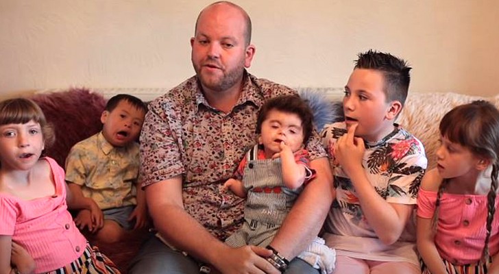 This 35-year-old single man is a real super-dad: he has adopted 5 disabled children and raises them alone