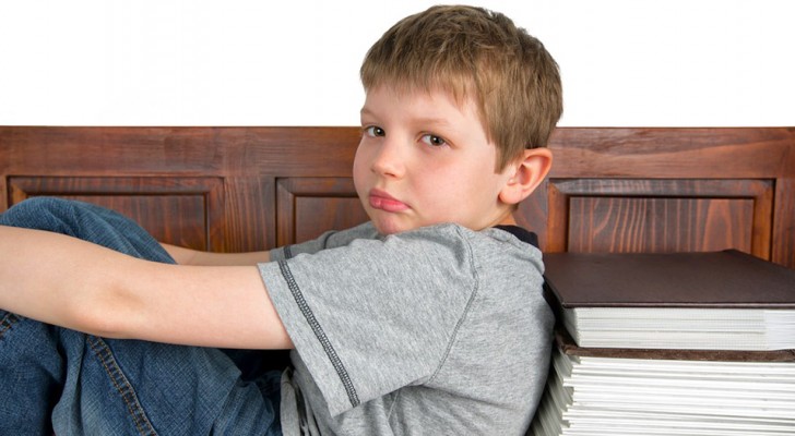 A teacher urges her pupil to spray himself with deodorant because of the bad smell and embarrasses him in front of everyone