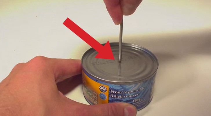 A man pokes a hole in a tin of tuna and the result is ... "enlightening!"